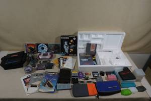 lot 159 image: Games and Accessories - NES Styrofoam, Rock Band USB Receivers