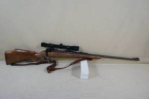 lot 8 image: Savage Arms Model 110 7mm Rem Mag Bolt Action Rifle with Tasco Scope