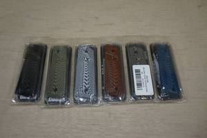 lot 62 image: Guuun G10 Grips for 1911 Pistols