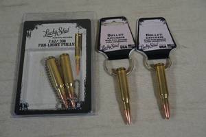 lot 65 image: Lucky Shot Fan Light Pulls and Bullet Keychains