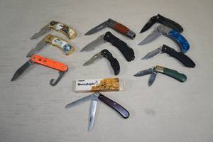 lot 86 image: Assorted Folding Pocket Knives - Al Agnew, Tiger-USA, Skoal
