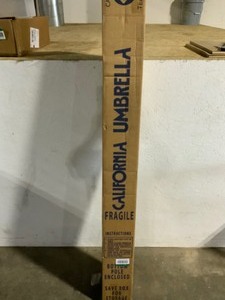 California Umbrella 7.5 ft. Bronze Aluminum Market Auto-Tilt Crank Lift Patio Umbrella in Terracotta Sunbrella. See Pictures