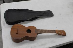 lot 610 image: 4-String Mini Acoustic Guitar with Soft Carry Bag