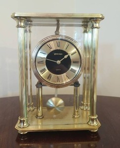 lot 12 image: Benchmark table clock