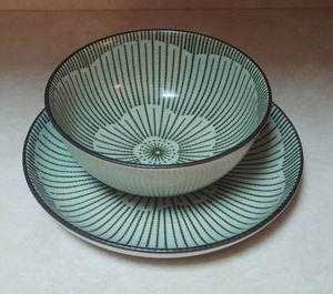 lot 74 image: Handmade stoneware bowl and saucer