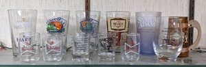 lot 41 image: 12-Piece Assortment of Vintage Bar Ware Guinness, Budweiser, Samuel Adams, Grain Belt by Siesta Ware, and More