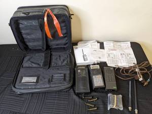 lot 123 image: Set of (3) Radio Scanners, Accessories, and Storage Bag