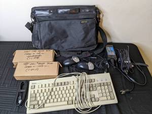 lot 108 image: Computer Accessories (Keyboard, Mice, Dell Batteries, Power Adapters, Laptop Bag_