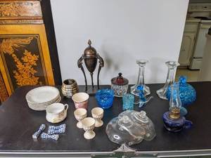 lot 71 image: Assortment of Decorative Plates, Glass Vases, Candle Holders, Blue Candy Dish, Oil Lamp and More