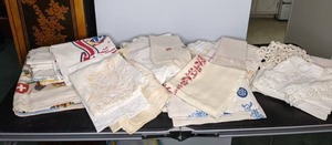 lot 90 image: Assortment of Table Cloths, Doilies, Placemats and More