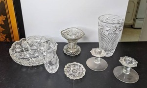 lot 68 image: Elegant Collection of (7) Cut Glass Pitcher, Centerpiece Bowl, Vases, Candle Holders and More