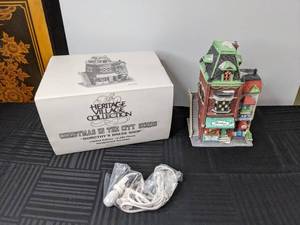 lot 440 image: RETIRED Department 56 Heritage Village Collection Dorothys Dress Shop Christmas in the City Series 11,05612,500