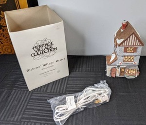 lot 418 image: Heritage Village Collection, Dickens Village Series, Poulterer Lighted Ceramic House