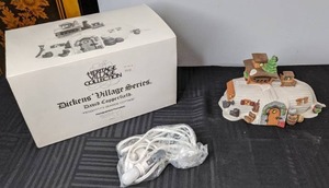 lot 419 image: Heritage Village Collection, Dickens Village Series, Peggottys Seaside Cottage Lighted Ceramic House, 1989