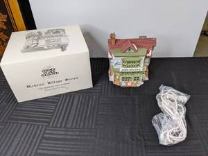 lot 402 image: Heritage Village Collection, Dickens Village Series, The Mermaid Fish Shoppe Lighted Ceramic Shop, 1988