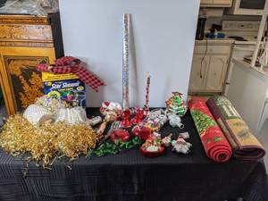 lot 497 image: An Assortment of Christmas Decorations Beading, Tinsel, Laser Light, Etc. 