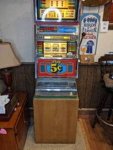 lot 8 image: 1982 Aristocrat Atlas Nickel Slot Machine Model R15CB with Stand
