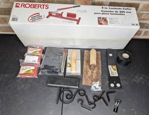 lot 609 image: Flooring Tools Laminate Cutter, Laminate Spacers, Pull Bar and More