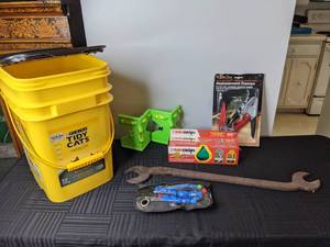 lot 629 image: Assortment of Tools Replacement Clamps, Rain Drain, ScrewFlathead Drivers, Hand Hacksaw, Masking Tape and More