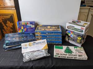 lot 630 image: Large Assortment of Decorative IndoorOutdoor Lights Motion & Static Projector, L.E.D. Lights, Pine Cone Lights, Icicle Lights, Super Bright String Lights and More