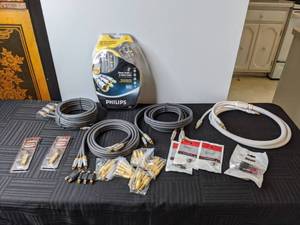 lot 631 image: Assortment of Electrical Cables Philips Stereo Audio  S-Video Cable, Couplers, Coaxial Power Jack and More