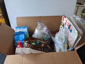 lot 566 image: Mixed Lot Toiletries, Epsom Salts, Bathing Wipes, Wig, Belt, Pill Boxes, Vintage LIFE Magazine and More