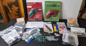 lot 574 image: NEW Christmas Light Repair Accessories Light Testers and Hundreds of Spare Bulbs