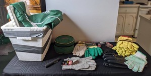 lot 563 image: Camping Gear Styrofoam Cooler, Coleman Cookware, New Windbreaker and 13 Pairs of New Gloves (Leather, Canvas, Vinyl Coated, Knit)