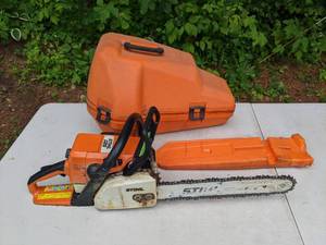 lot 6 image: Stihl 025 Gas-Powered Chainsaw 311Y with Rollomatic E Bar and Cases for Machine & Bar