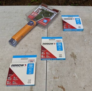 lot 596 image: New Arrow Hammer Tacker and 3 Boxes of T50 Staples