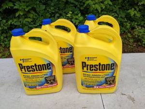 lot 651 image: Set of (4) 1-Gallon Bottles of Prestone 5050 Prediluted Antifreeze  Coolant.