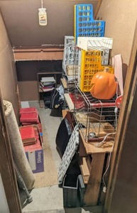 lot 605 image: Storage Closet Contents Plastic Paper Organizers, Wire Bins, Charles Dickens Book Collections, Sheet Music and More