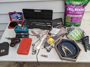 lot 799 image: Miscellaneous Garage and Lawn Items Landscaping Wire, Grass Seed, Soldering Tools, Drill Bits, Hole Saw Kit and More