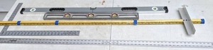 lot 701 image: Let Me Level With You, This Lot Rules Carpenters Square, 2 Levels, T-Square, Yardstick