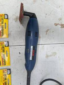 lot 720 image: Ryobi Detail Sander DS-1000 plus Multiple Packages of Tool Shop Detail Sandpaper in Variety of Grits