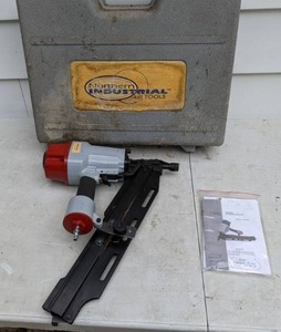 lot 721 image: Northern Industrial Air Tools Framing Nailer Model 1000092 plus Multiple Rows of Nails