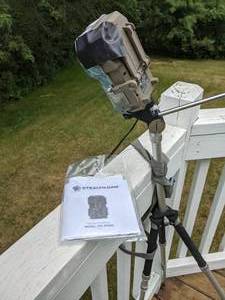 lot 694 image: Stealth Cam Digital Scouting Camera on Tripod, Includes Batteries and Moultrie Display Unit