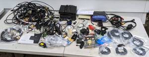lot 751 image: Assortment of Electrical Tools Linksys Wireless Access Point Router, Night Lights, Light Socket Automatic Security Light Control, Electrical Sockets and More