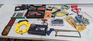 lot 674 image: Variety of Tools Hacksaw, Rivet Tools, Tape Measures, Johnson 700 Structo-Cast Protractor, Fiskars Fingertip Knife, and Much More