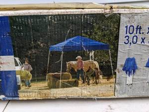 lot 665 image: Canopy Factory 10x10 Slant Leg Pop Up Sport Canopy