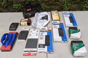 lot 681 image: Sears Craftsman 3 Belt Sander, Spare Belts, Block Sanders, Sanding Sheets and Other Sanding Supplies