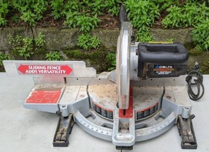 lot 676 image: Delta Sidekick 12 Compound Miter Saw