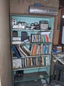 lot 770 image: Wooden Book Shelf Plus All of the Contents-Manuals, Data Books, and Radio Equipment