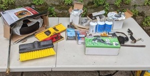 lot 777 image: Assortment of Trailer and Car AccessoriesMaintenance Items ATV Hitch, Surface Cleaner, Oil Filter, and More