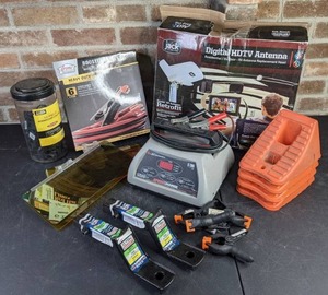 lot 699 image: AutomotiveRV Items 2 New Towsmart X-Mount Hitches, Wheel Chocks, Schumacher Speed Charge, JackTV Antenna and More