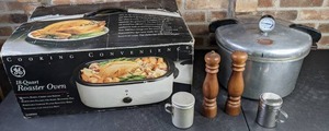 lot 715 image: GE 18 Quart Roaster Oven, Vintage National Presto Cooker Canner No. 7, Two Pair of Salt & Pepper Shakers