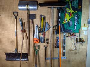 lot 138 image: Assortment of Garage and Lawn Tools Shovels, Rake, Broom, Saws, Level, Screwdrivers and More