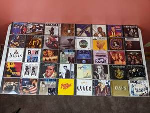 lot 34 image: Collection of 40 CDs Louis Armstrong, Clint Black, Genesis, Elvis, Elton John and More
