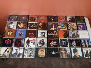 lot 33 image: Collection of 40 Music CDs Billy Joel, Frank Sinatra, Lou Reed, Santana and More