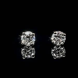 lot 70 image: Classic Luxury 0.51ctw Diamond Round Solitaire Stud Earrings in 14k White Gold